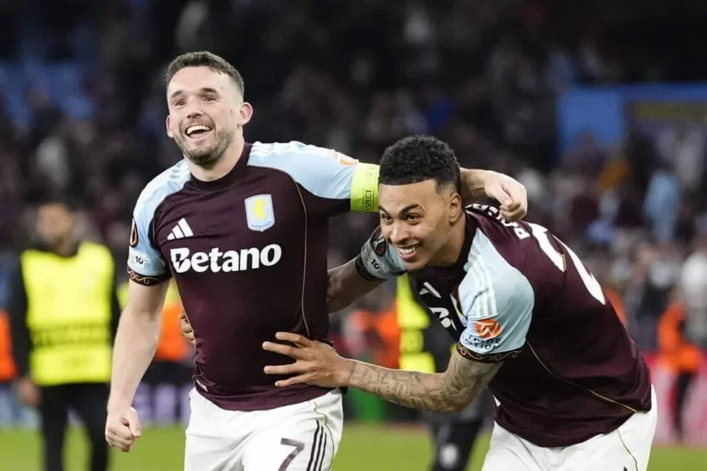 Aston Villa's John McGinn and Morgan Rogers celebrating